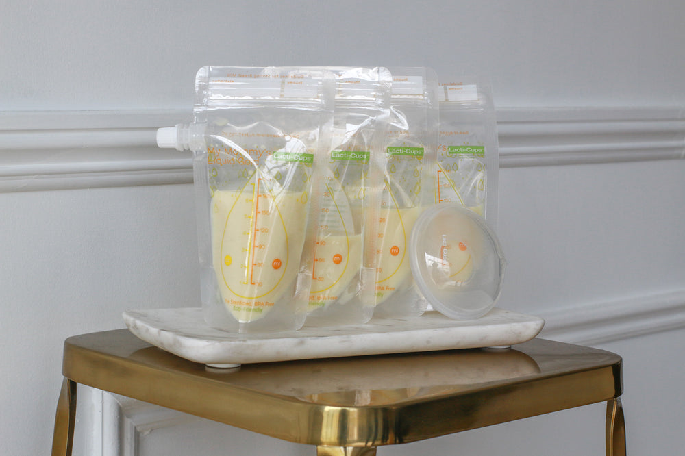 Reusable & Sealable Breastmilk Storage Bags with Screw-Cap Spout, 25 Pack - My Mommy's Liquid Gold Breast milk storage, breastfeeding, Breastmilk bags, breastmilk storage bags, collects breastmilk leaks, colostrum collection, reusable bags, Storage Bags Lacticups: The Original Breastmilk Collection Cup | Essential Breastfeeding Supply